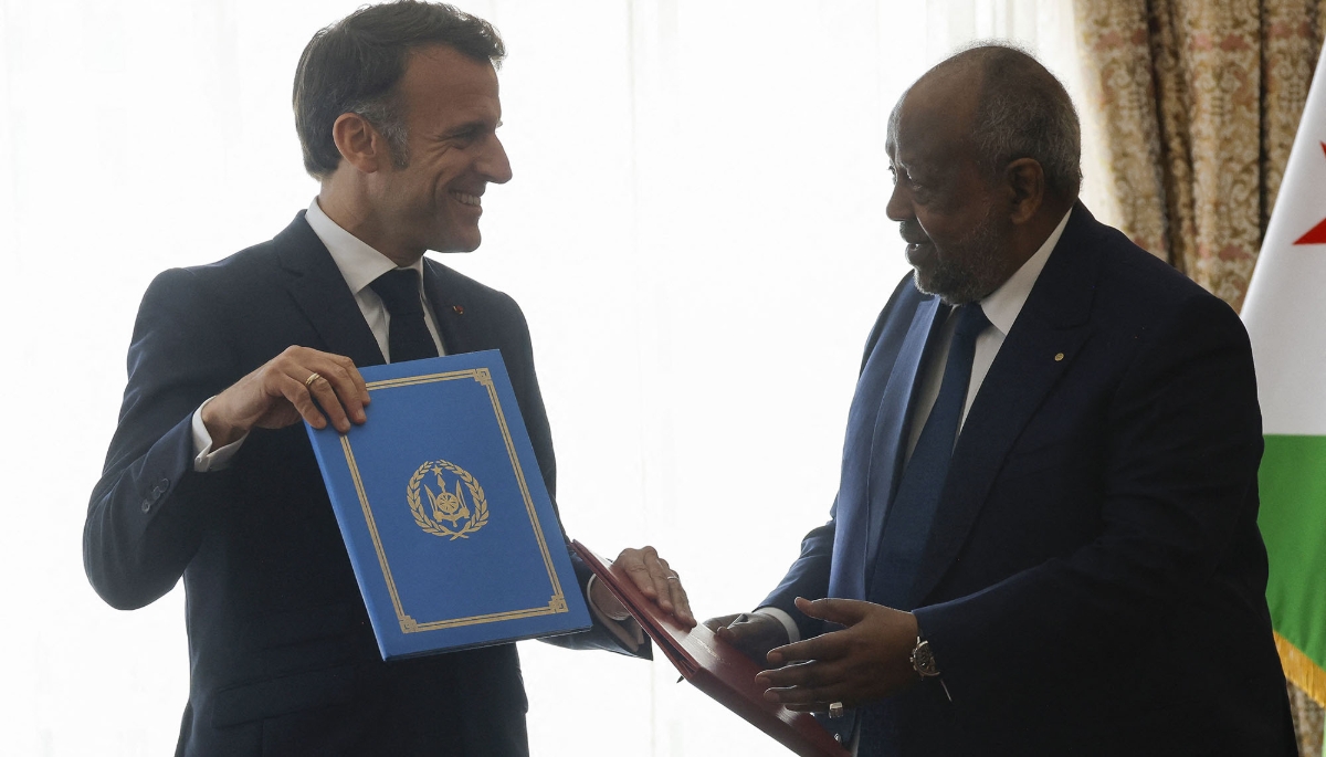 France's President Emmanuel Macron and Djibouti's President Ismaïl Omar Guelleh meet for the Defense Cooperation Treaty in Djibouti, 21 December 2024.