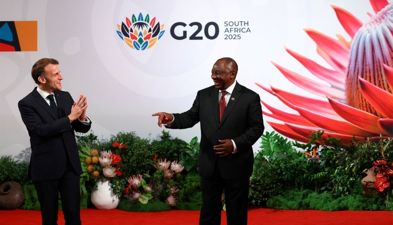France's President Emmanuel Macron with his South African counterpart Cyril Ramaphosa in Johannesburg, South Africa, on 22 November 2025. 