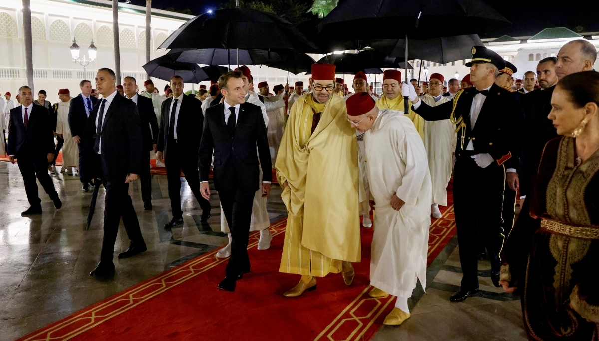 Emmanuel Macron and Mohammed VI arrive at the Royal Palace in Rabat for a state dinner on 29 October 2024.