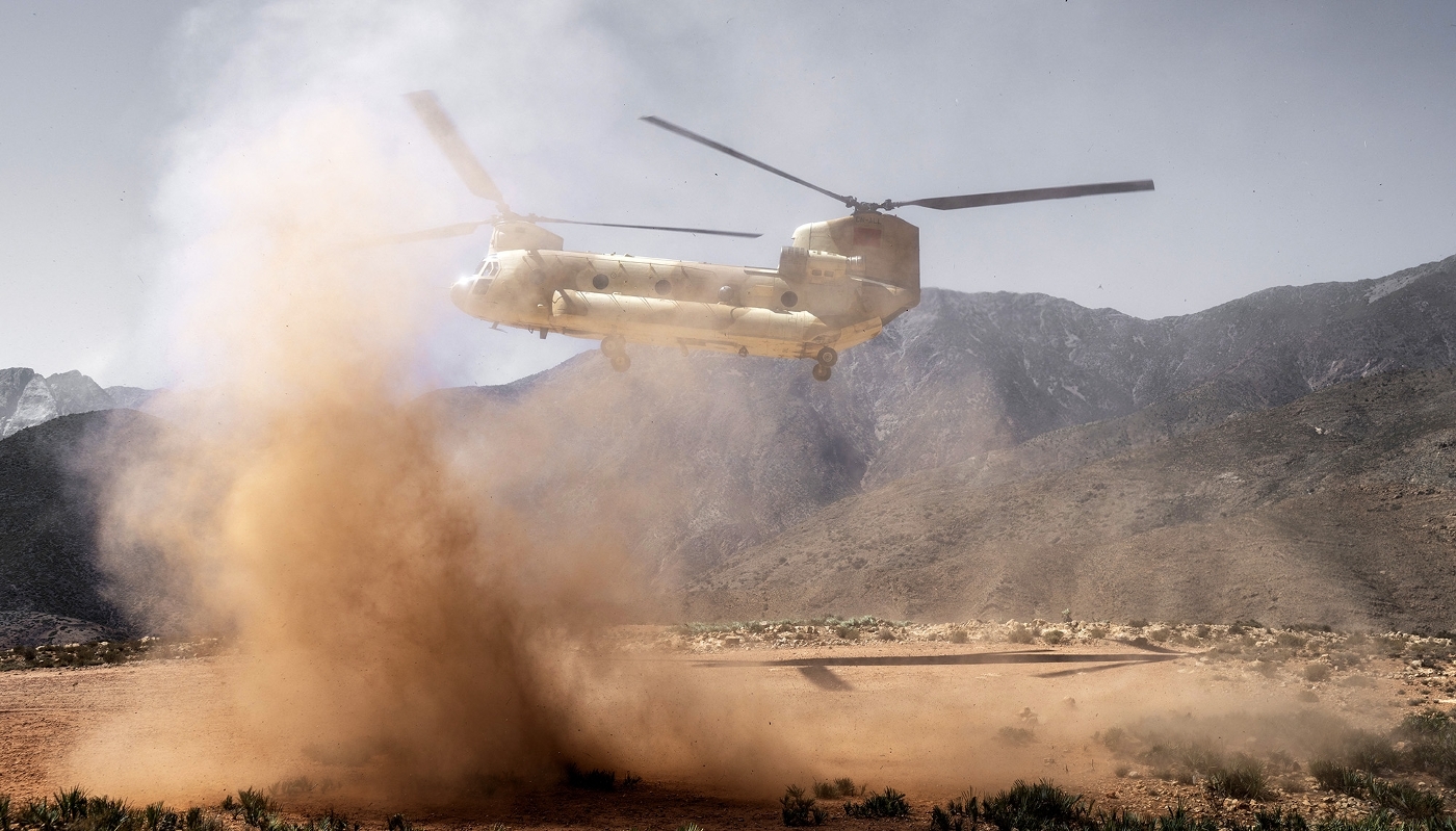 A Royal Moroccan Air Force CH-47D Chinook military transport helicopter lands in Tizi n'Test, Morocco, 2023.