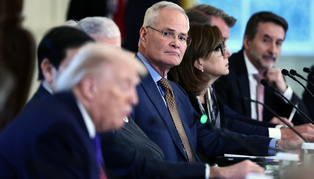 ExxonMobil CEO Darren Woods (centre) in a meeting with President Donald Trump at the White House, Washington, DC, on 9 January 2026.