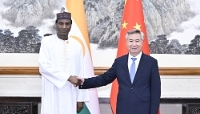 Prime Minister Ali Lamine Zeine meets Xi Li, secretary of the Central Committee of the Communist Party of China, in Beijing in September 2024.