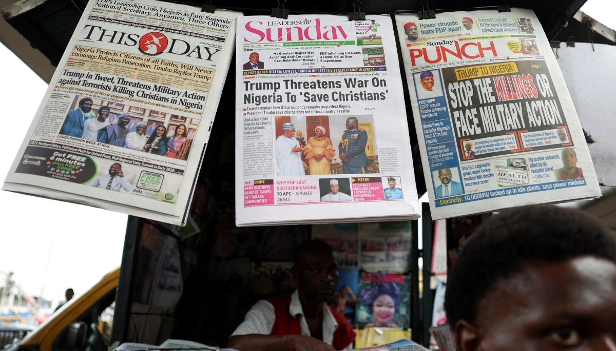 Newspapers reporting US President Donald Trump's message to Nigeria, in Ojuelegba, Lagos, 2 November 2025. 