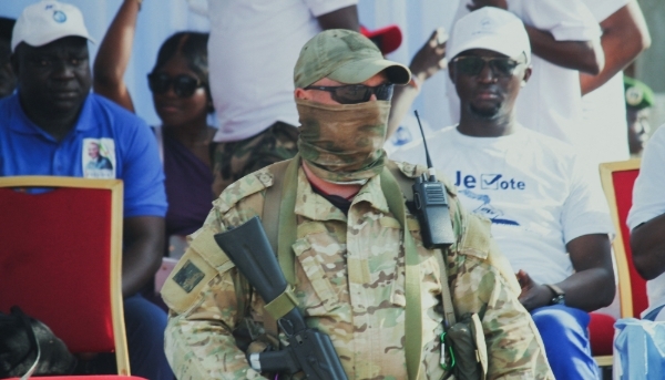 A Russian officer from Wagner provides security for Faustin-Archange Touadera during the referendum campaign to change the constitution, in Bangui, 16 July 2023.