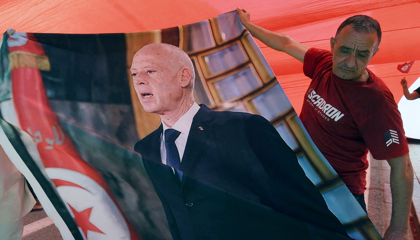 A supporter of Tunisian president Kais Saied during a rally in Tunis on 25 July 2024.