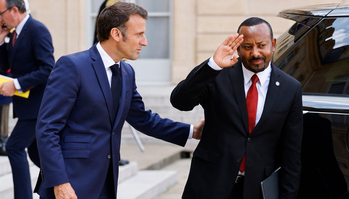 Ethiopia's Prime Minister Abiy Ahmed (R) and French President Emmanuel Macron (L) in Paris on 23 June, 2023.