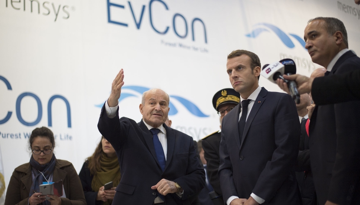 Emmanuel Macron (right) and Issad Rebrab (centre) visit a Cevital industrial project in Charleville-Mezières, France, 7 November 2018.