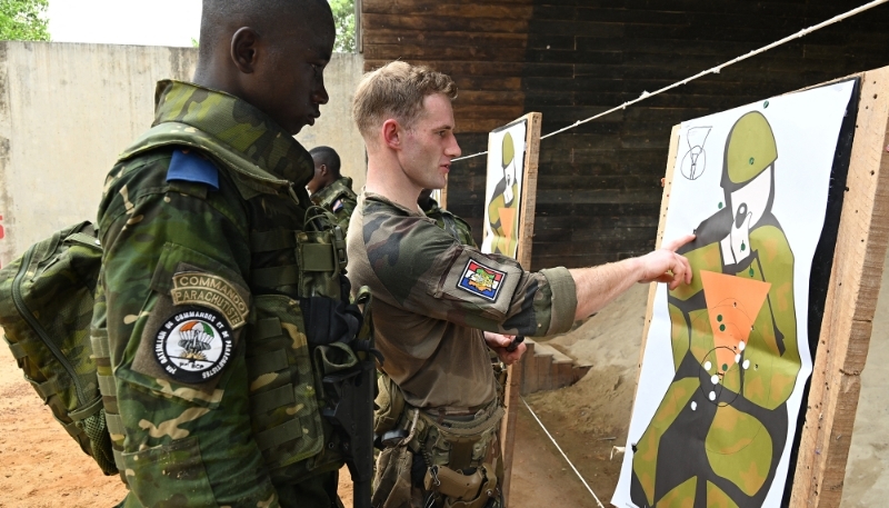 French and Ivorian soldiers are seen at a shooting range at the 43em BIMA, the base of the 43rd Marine Infantry Battallion of the French Army in Abidjan, 11 February 2025.