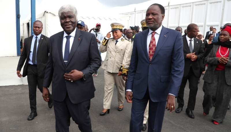 Prime Minister Robert Beugré Mambé (left) with the minister of mines and petroleum, Mamadou Sangafowa-Coulibaly, in Abidjan, June 2025.