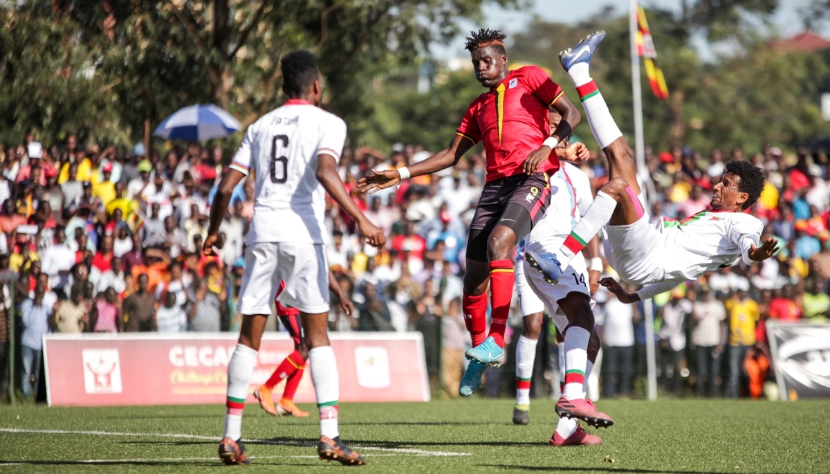 The Eritrean National Football team (white) goes against Uganda in Kampala, 19 December 2019.