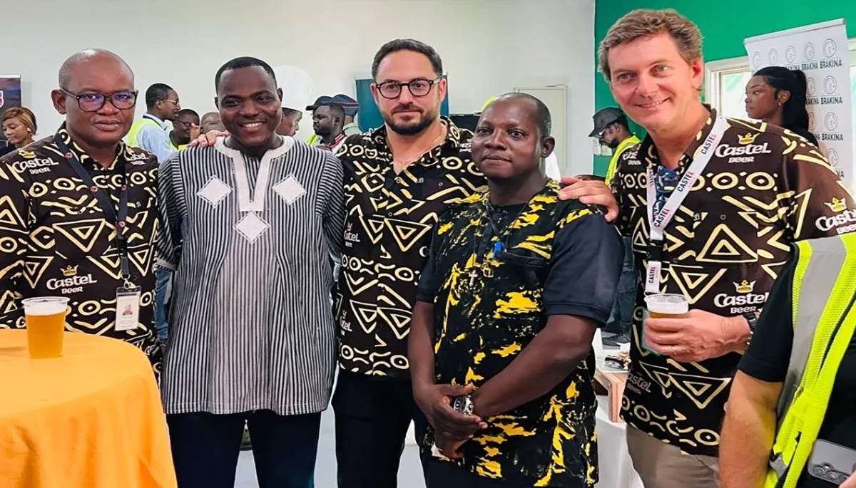 Gregory Clerc (centre) visiting Brakina, one of the Castel Group's subsidiaries, in Burkina Faso on 15 October 2025.