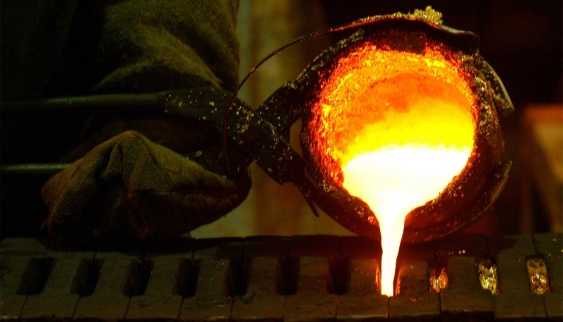 Refined gold poured into moulds at Rand Refinery in Germiston, South Africa, May 2006.