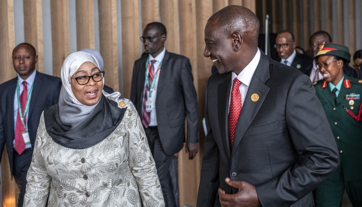 Tanzanian President Samia Suluhu Hassan speaks to his Kenyan counterpart William Ruto in Addis Ababa in February 2025.