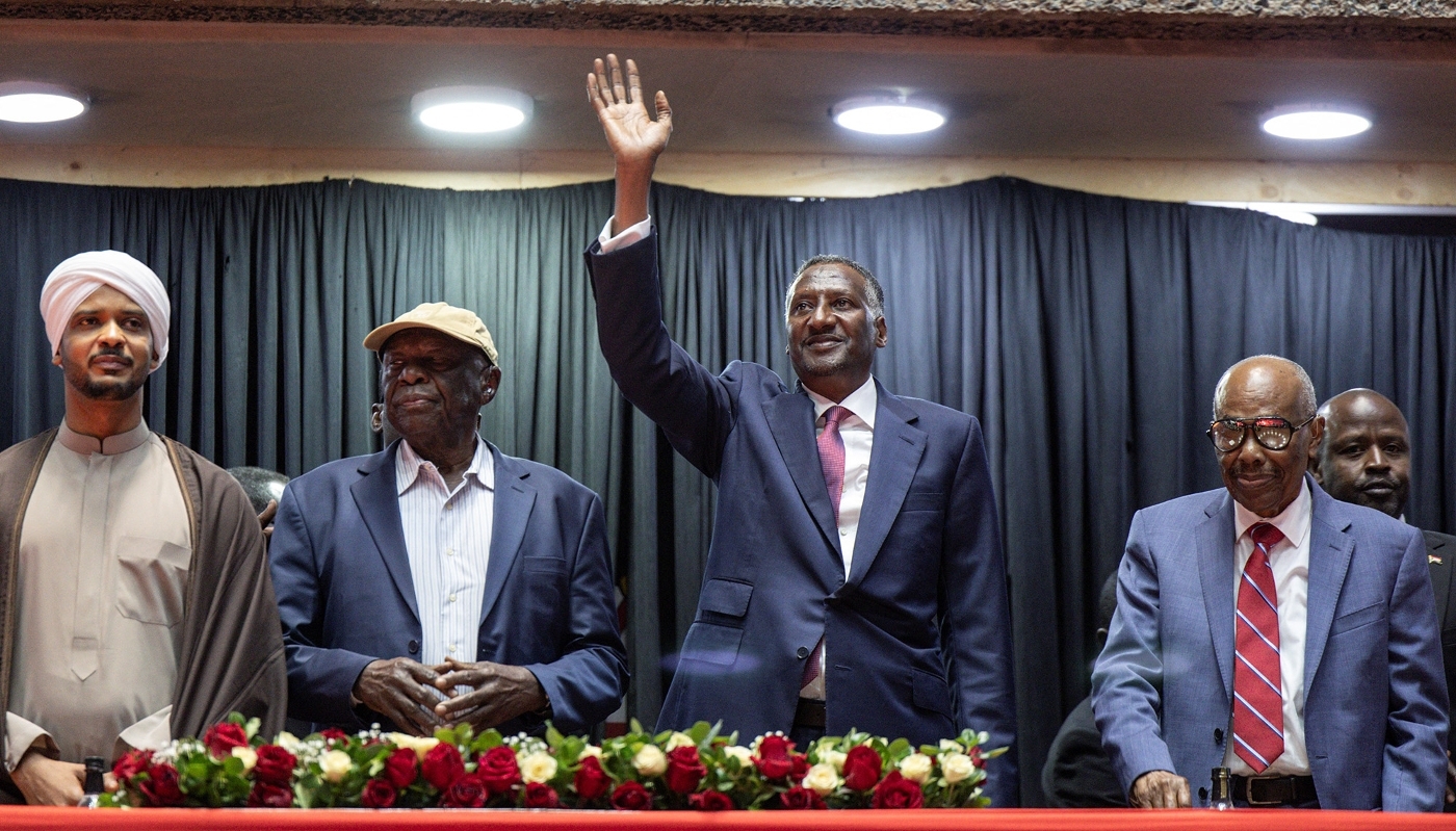 Mohamed Hamdan Dagalo (centre) and Abdelaziz al-Hilu (second from left) in Nairobi on 18 February 2025.