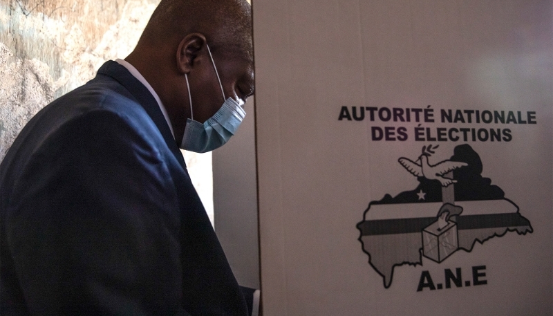 President Faustin-Archange Touadéra casts his ballot in the presidential and legislative elections in Bangui, in December 2020. 