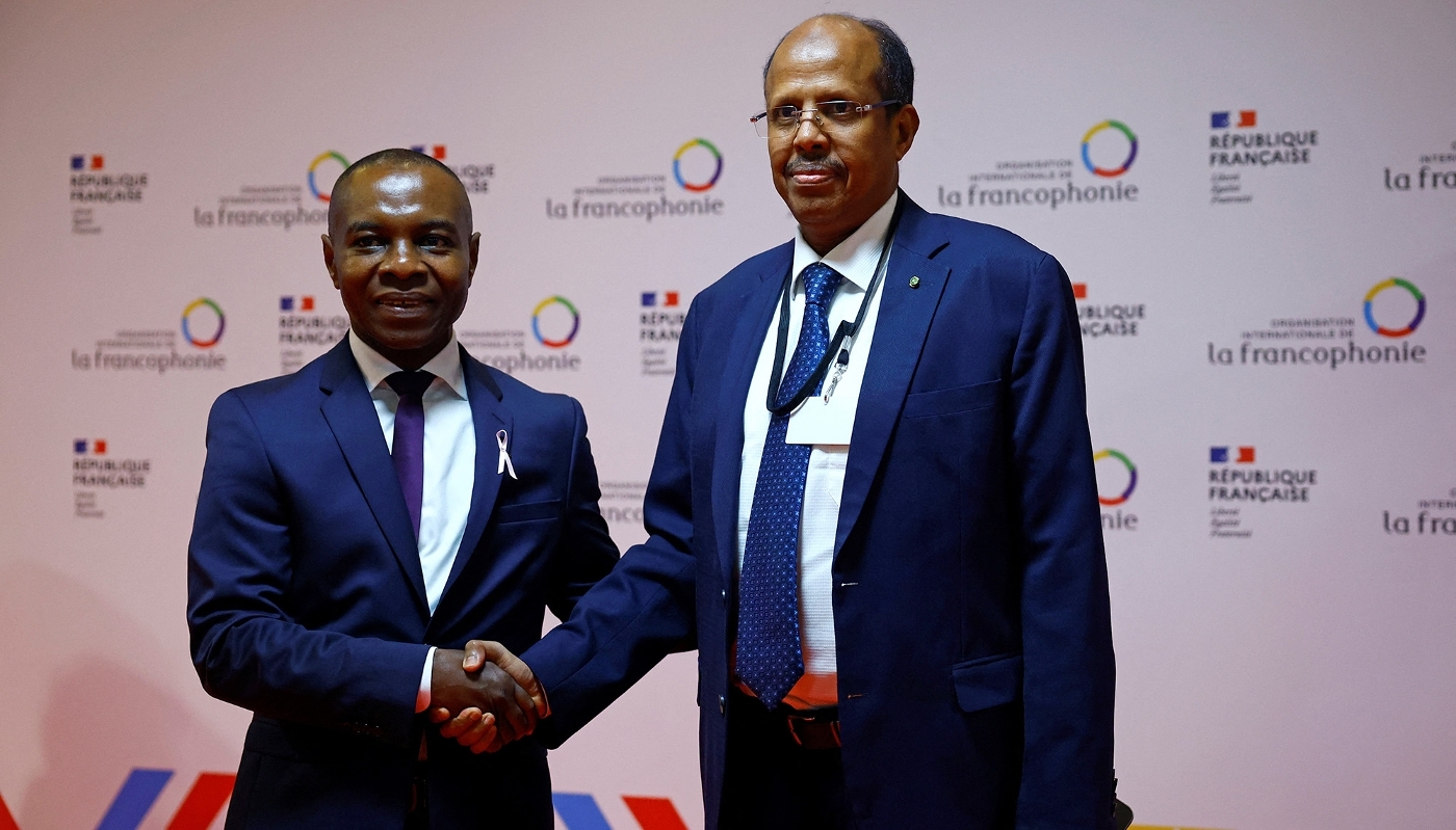 French junior minister for the Francophonie Thani Mohamed Soilihi (left) welcomes Mahamoud Ali Youssouf, Djibouti's foreign minister, on the eve of the 19th Francophonie Summit in Paris on 4 October 2024.