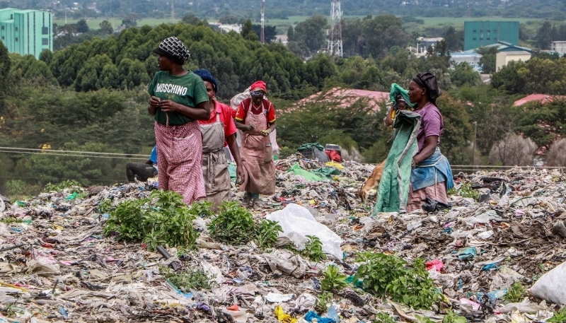 Women collect recyclable materials at the Giotto landfill in Kenya, in June 2025.