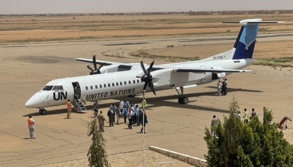 Ethiopian former peacekeepers, deployed to the Abyei region, disembark from a United Nations aircraft in Sudan on 15 May 2022 after seeking asylum. 