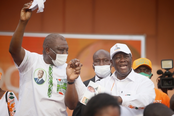 Ivorian President Alassane Ouattara (R) and his Prime Minister Hamed Bakayoko (L) during the 2020 presidential campaign.