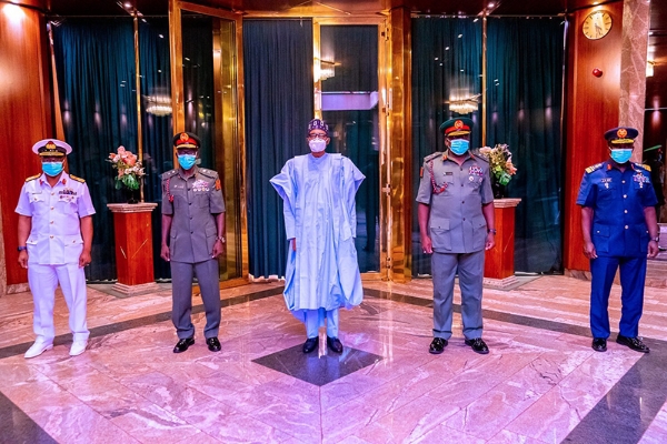 Nigerian president Muhammadu Buhari with the new army heads on 26 January.