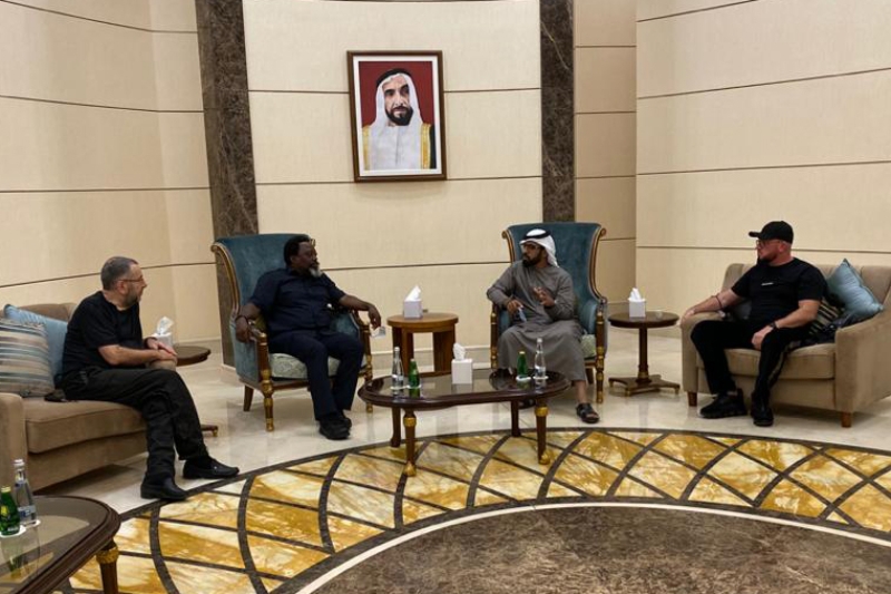 Alexander Zingman, seated next to Joseph Kabila.