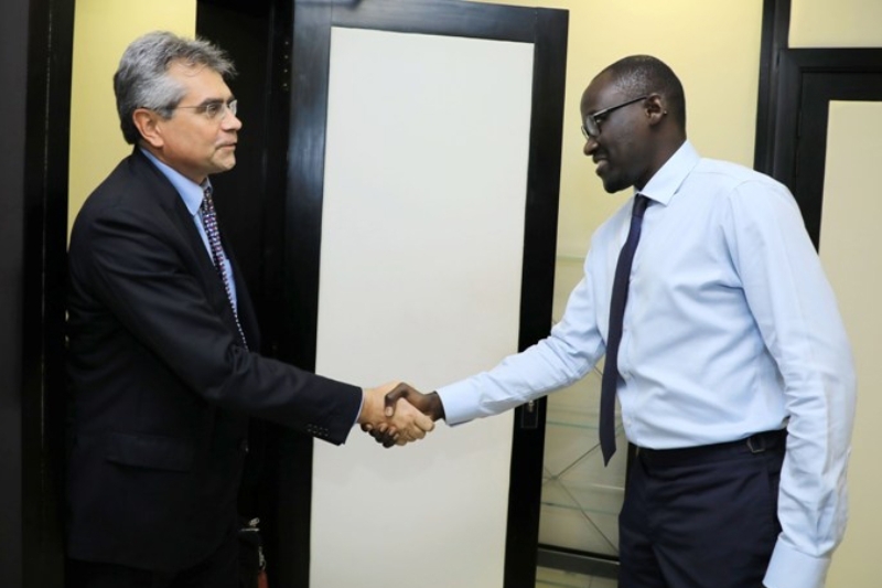 Sergio Laura (left), managing director of ENI Ivory Coast with Abdourahmane Cissé, secretary general of the Ivorian Presidency.