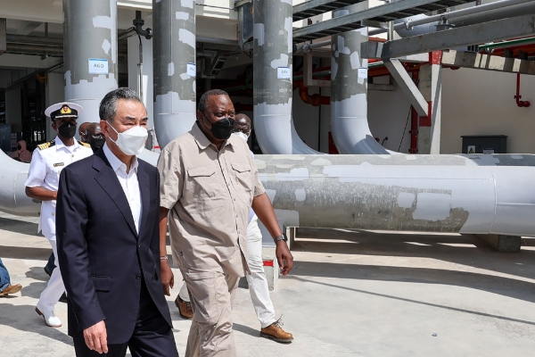 Kenyan President Uhuru Kenyatta with Chinese Foreign Minister Wang Yi at the Kipevu oil terminal, Mombasa, 6 January 2022.