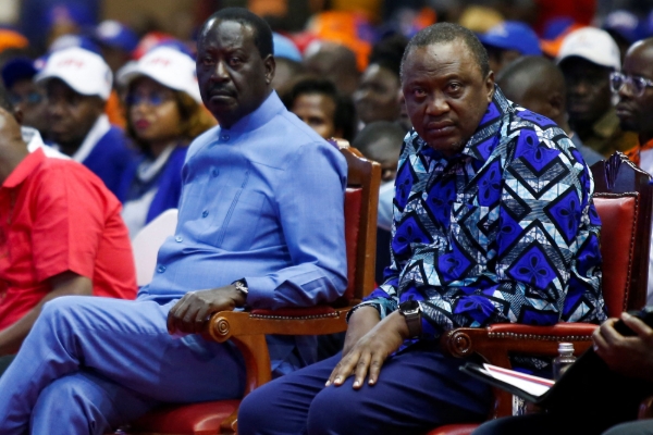 Kenyan presidential candidate Raila Odinga (left) and President Kenyatta on 12 March 2022.