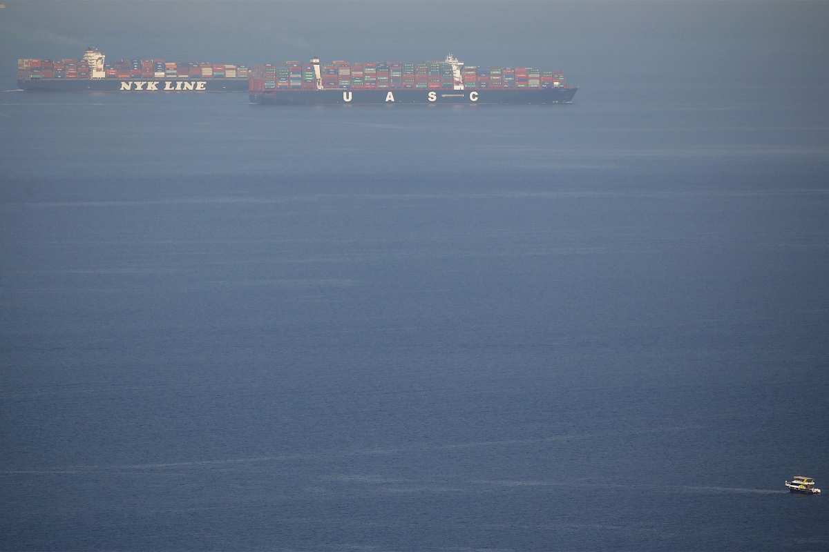 Shipping container boats cross the Gulf of Suez towards the Red Sea before entering the Suez Canal, in Ain Sokhna, Egypt on 24 April 2017.