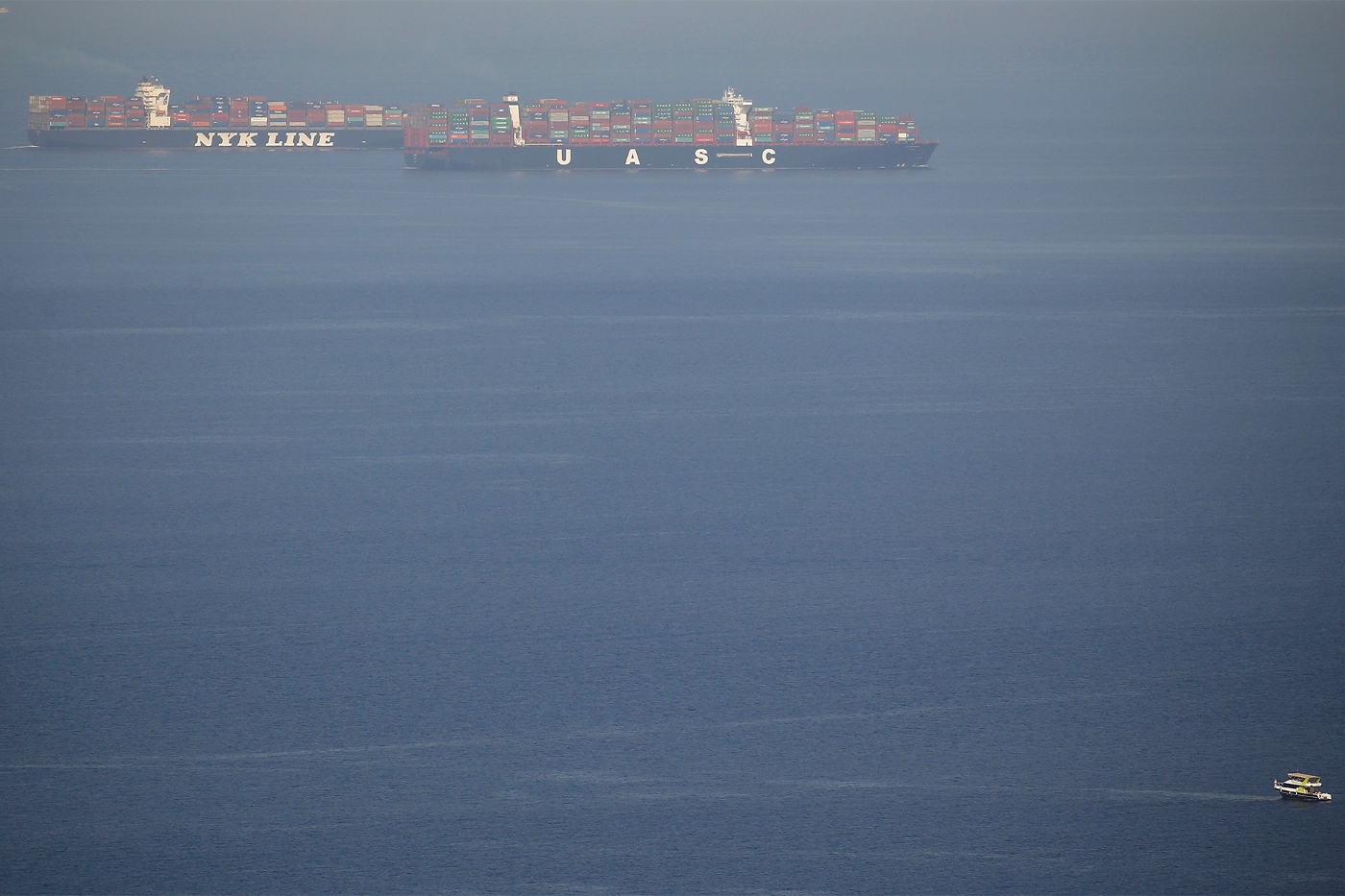 Shipping container boats cross the Gulf of Suez towards the Red Sea before entering the Suez Canal, in Ain Sokhna, Egypt on 24 April 2017.