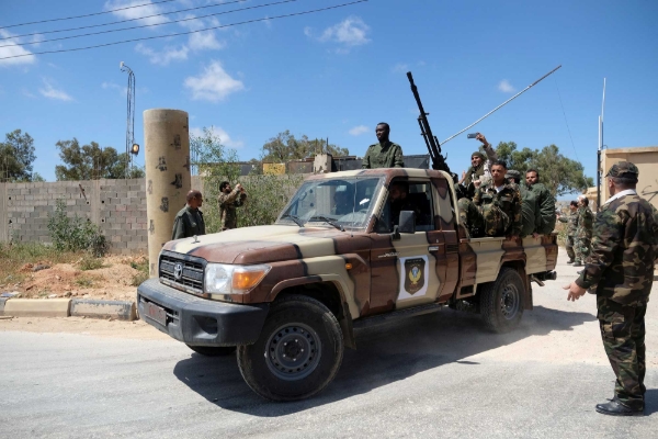 Libyan National Army (LNA) members head out of Benghazi to reinforce the troops advancing to Tripoli.