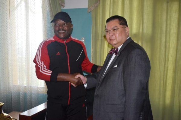 US Special Envoy J. Peter Pham, mender-in-chief of fences between Bujumbura and Washington, with Burundi's late president, Pierre Nkurunziza.