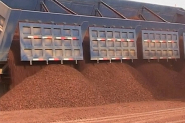 Unloading an iron cargo in the port of Forecariah, Guinea.