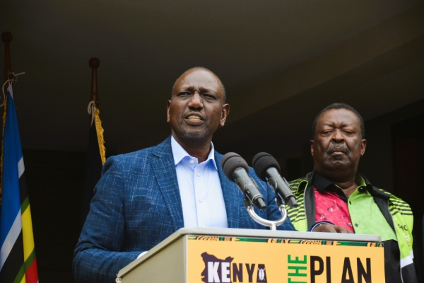 William Ruto with Amani National Congress (ANC) party leader Musalia Mudavadi (right).