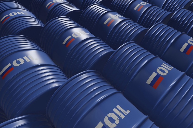 Oil barrels with a Russian flag.