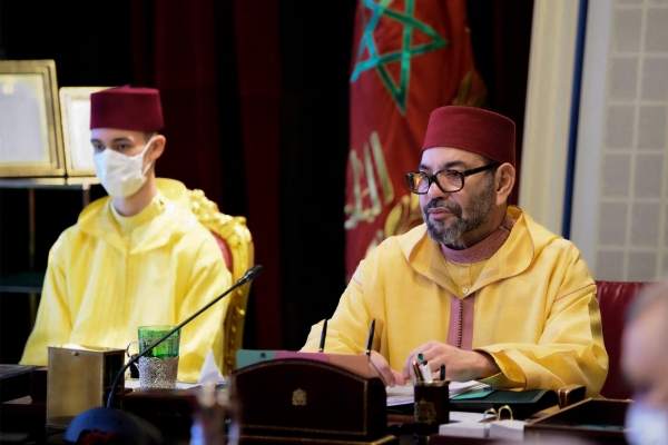 Morocco's King Mohammed VI and his son Prince Moulay Hassan at the Royal Palace, Rabat, 13 July 2022.